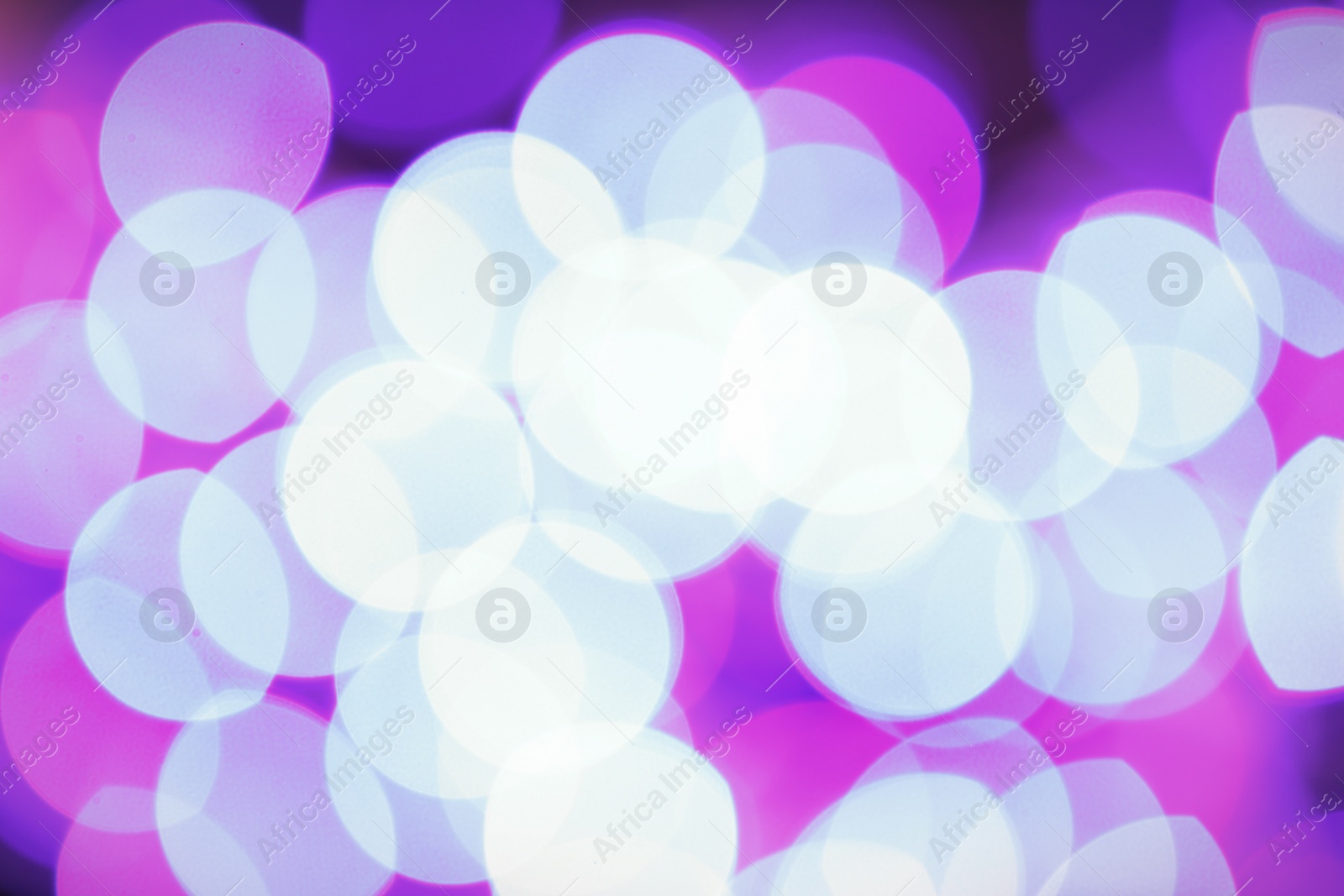 Photo of Beautiful glowing lights as background. Bokeh effect