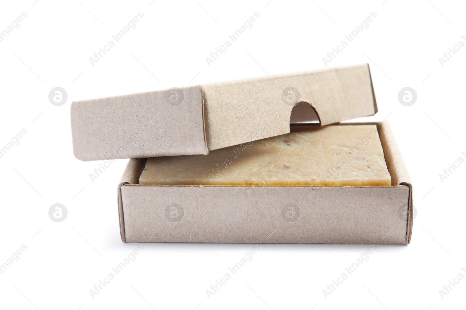 Photo of Hand made soap bar in cardboard package on white background