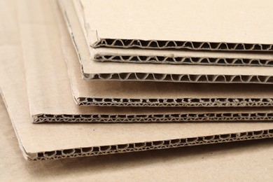 Photo of Sheets of brown corrugated cardboard, closeup view