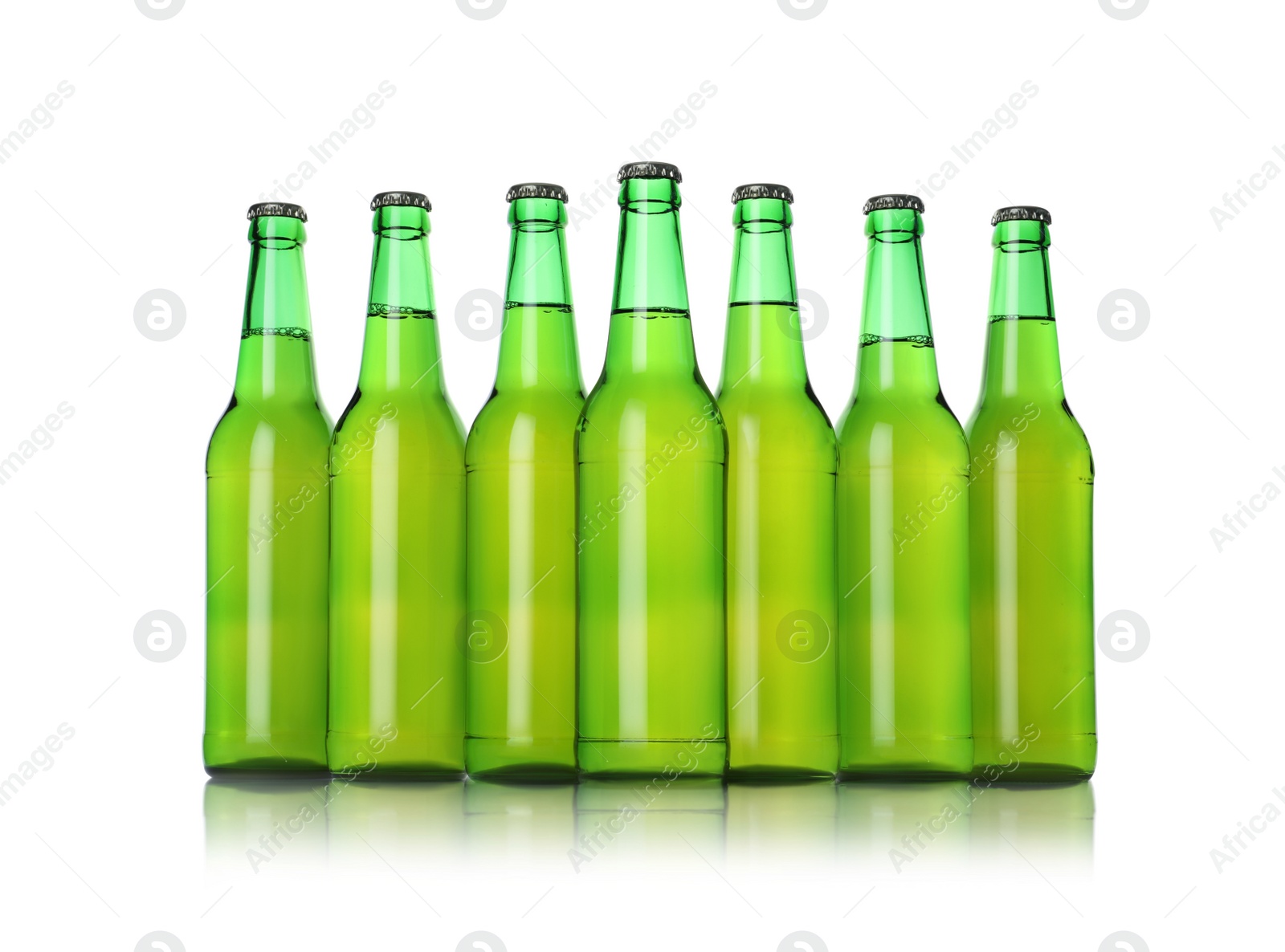 Photo of Green bottles with beer isolated on white