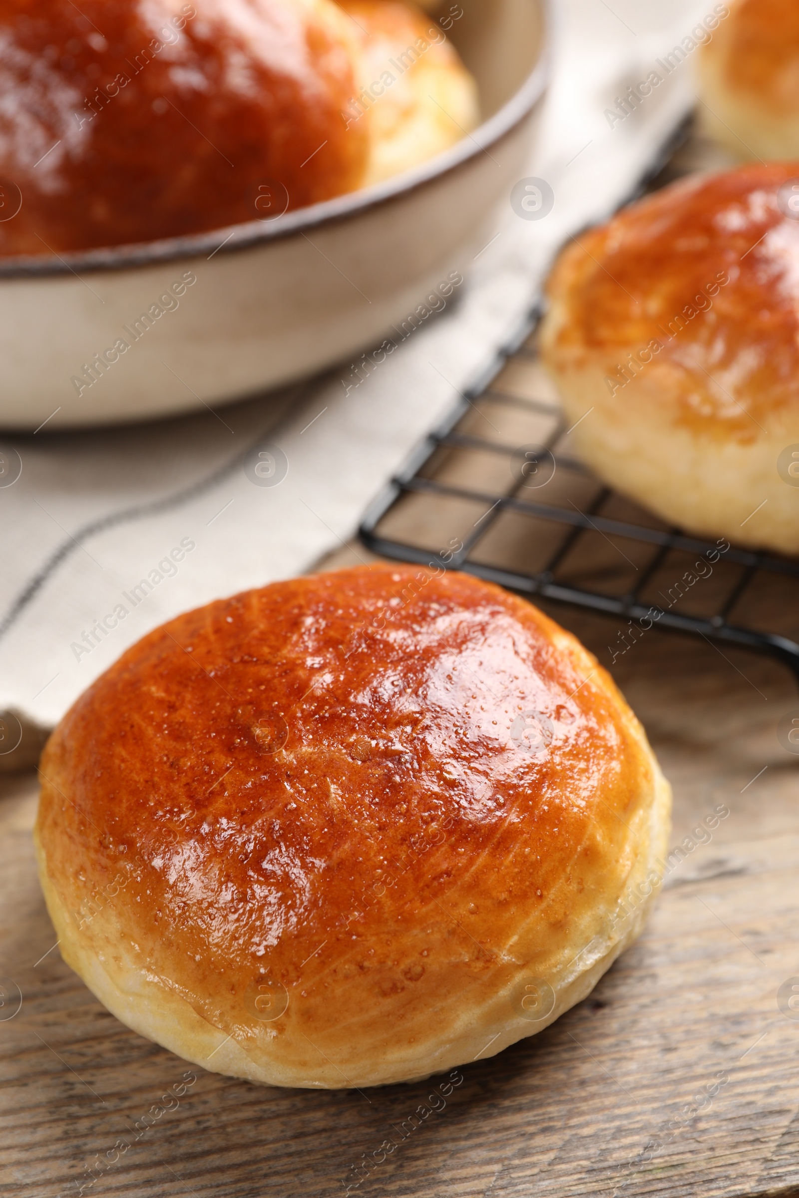 Photo of Tasty scones prepared on soda water on wooden table