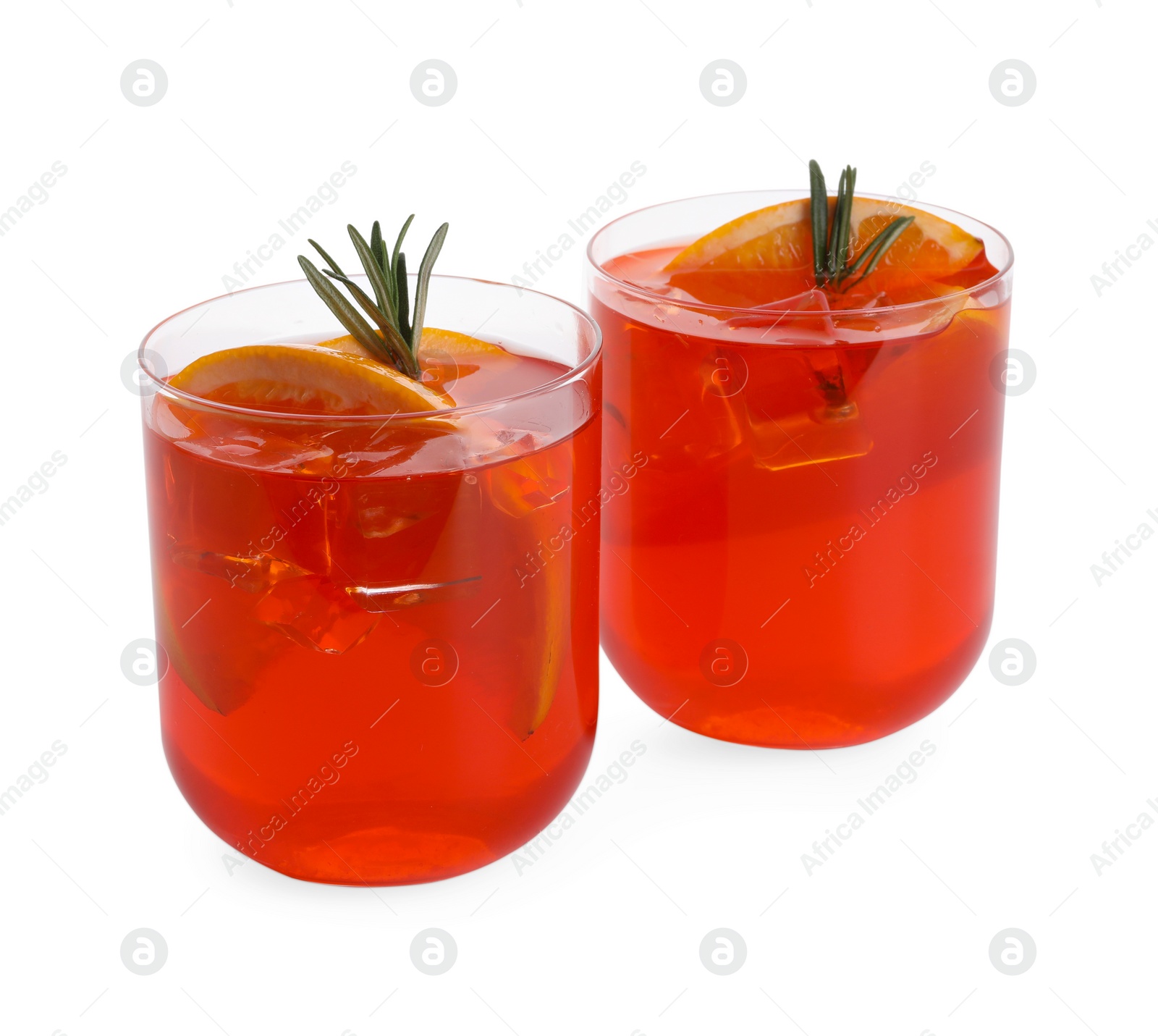 Photo of Aperol spritz cocktail, orange slices and rosemary in glasses isolated on white