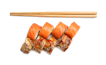 Photo of Set of delicious sushi rolls on white background, top view