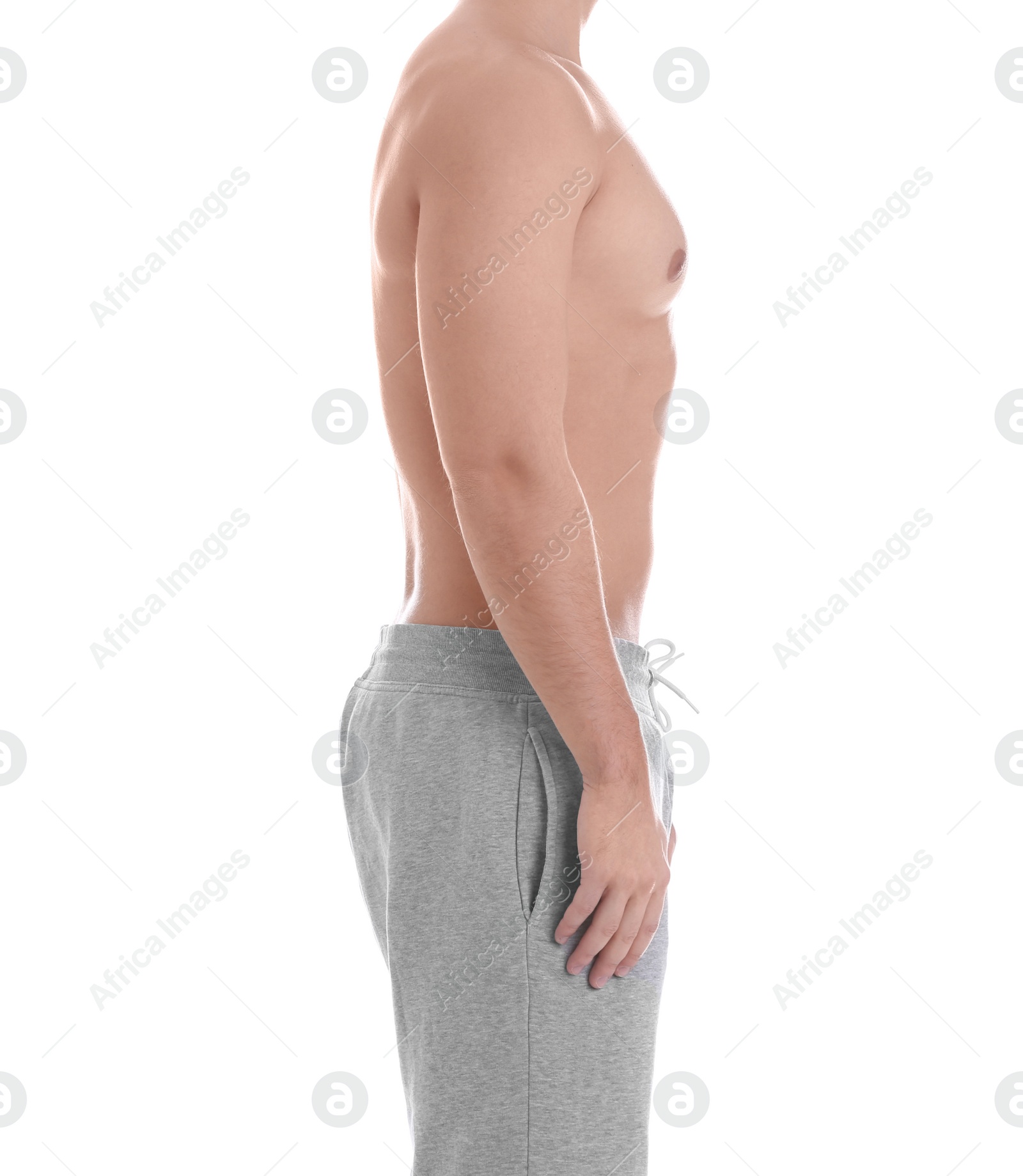 Photo of Young athletic man on white background, closeup. Weight loss