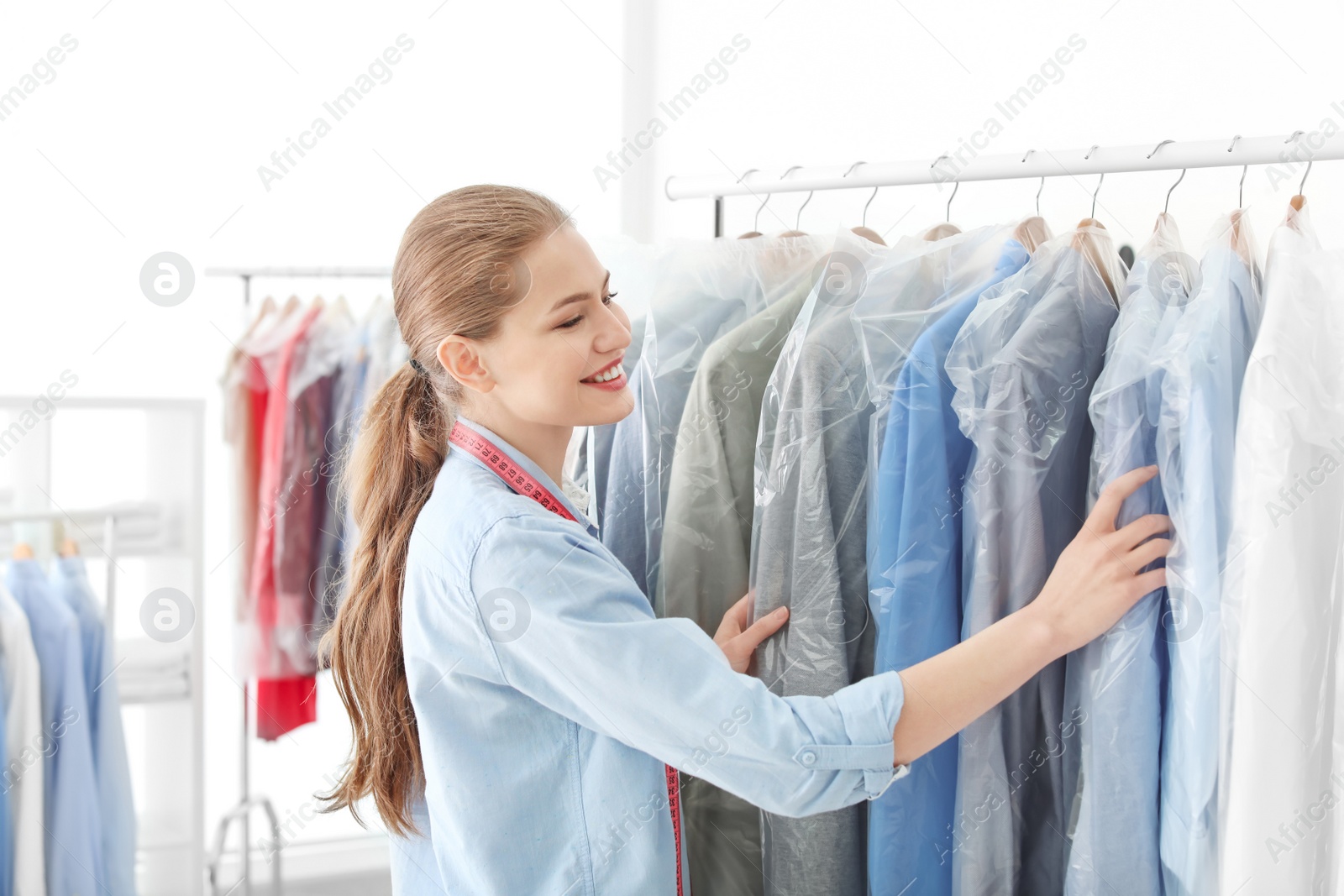 Photo of Employee working at dry-cleaner's