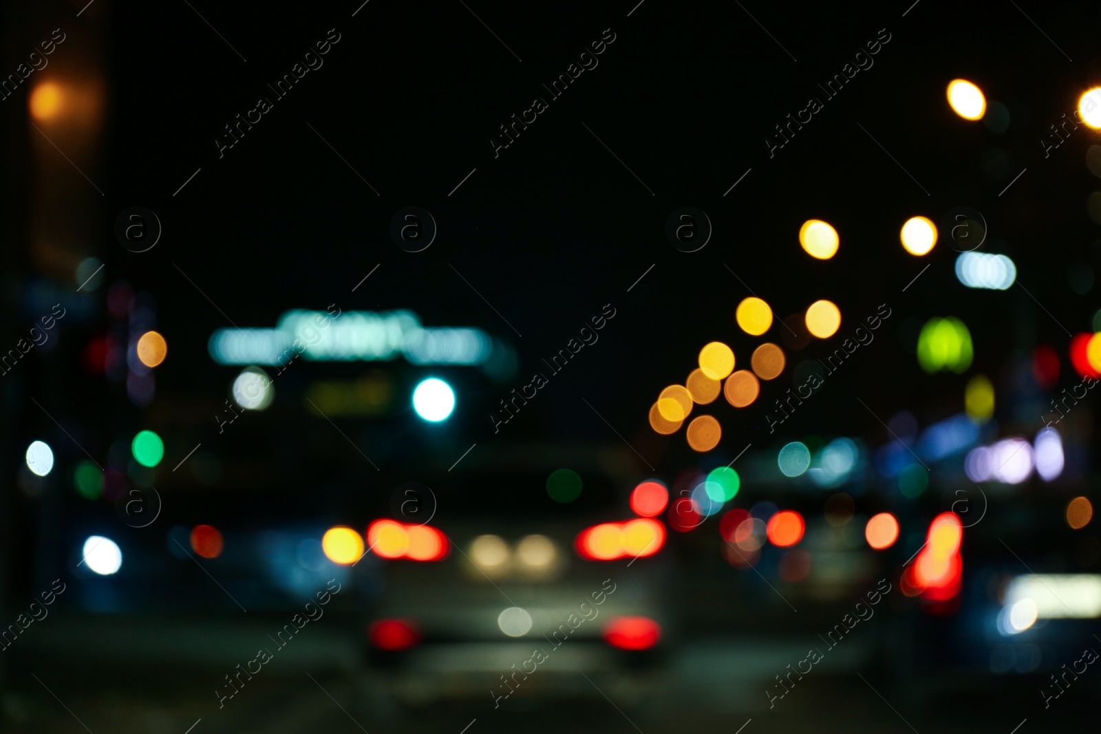 Photo of Blurred view of city at night. Bokeh effect