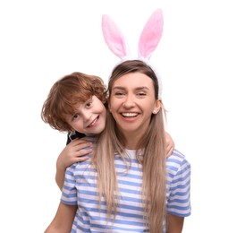 Photo of Easter celebration. Mother and her cute little son with bunny ears isolated on white
