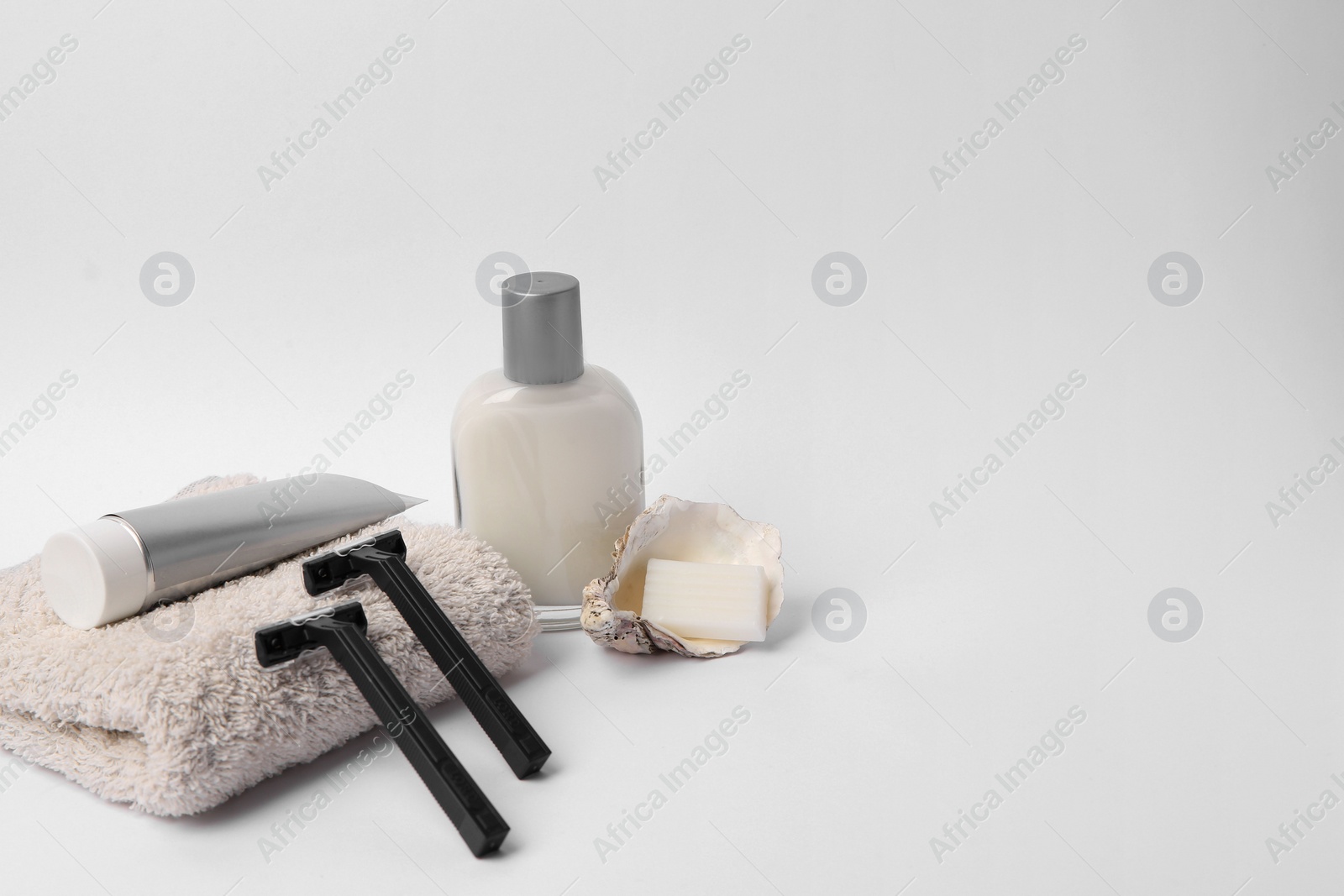 Photo of Different men's shaving accessories on white background. Space for text