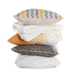 Photo of Stylish soft pillows and folded plaid on white background