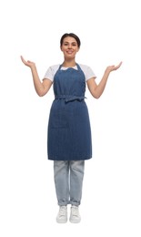 Young woman in blue apron on white background