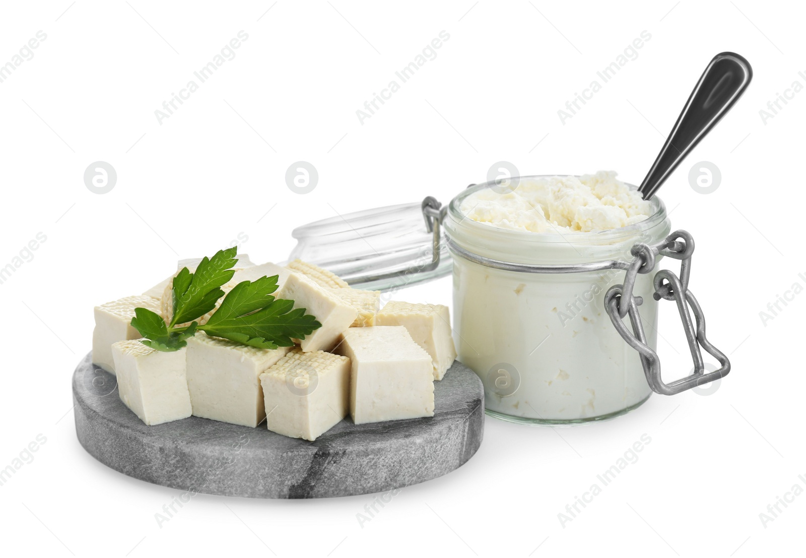 Photo of Different types of tofu cheese on white background