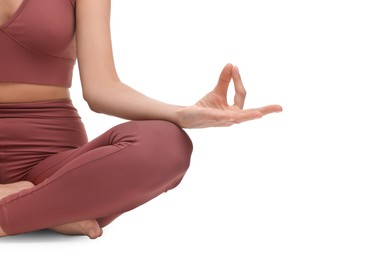 Woman practicing yoga on white background, closeup. Lotus pose