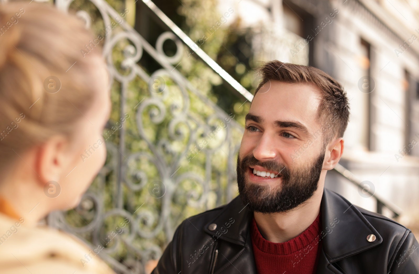 Photo of Lovely young couple spending time together outdoors