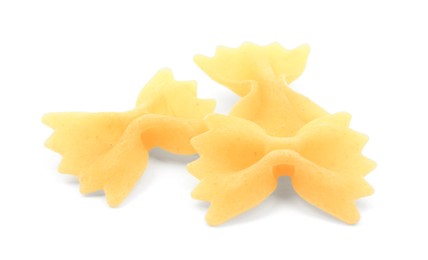 Photo of Raw farfalle pasta isolated on white. Italian cuisine