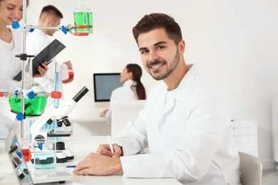 Medical student working in modern scientific laboratory