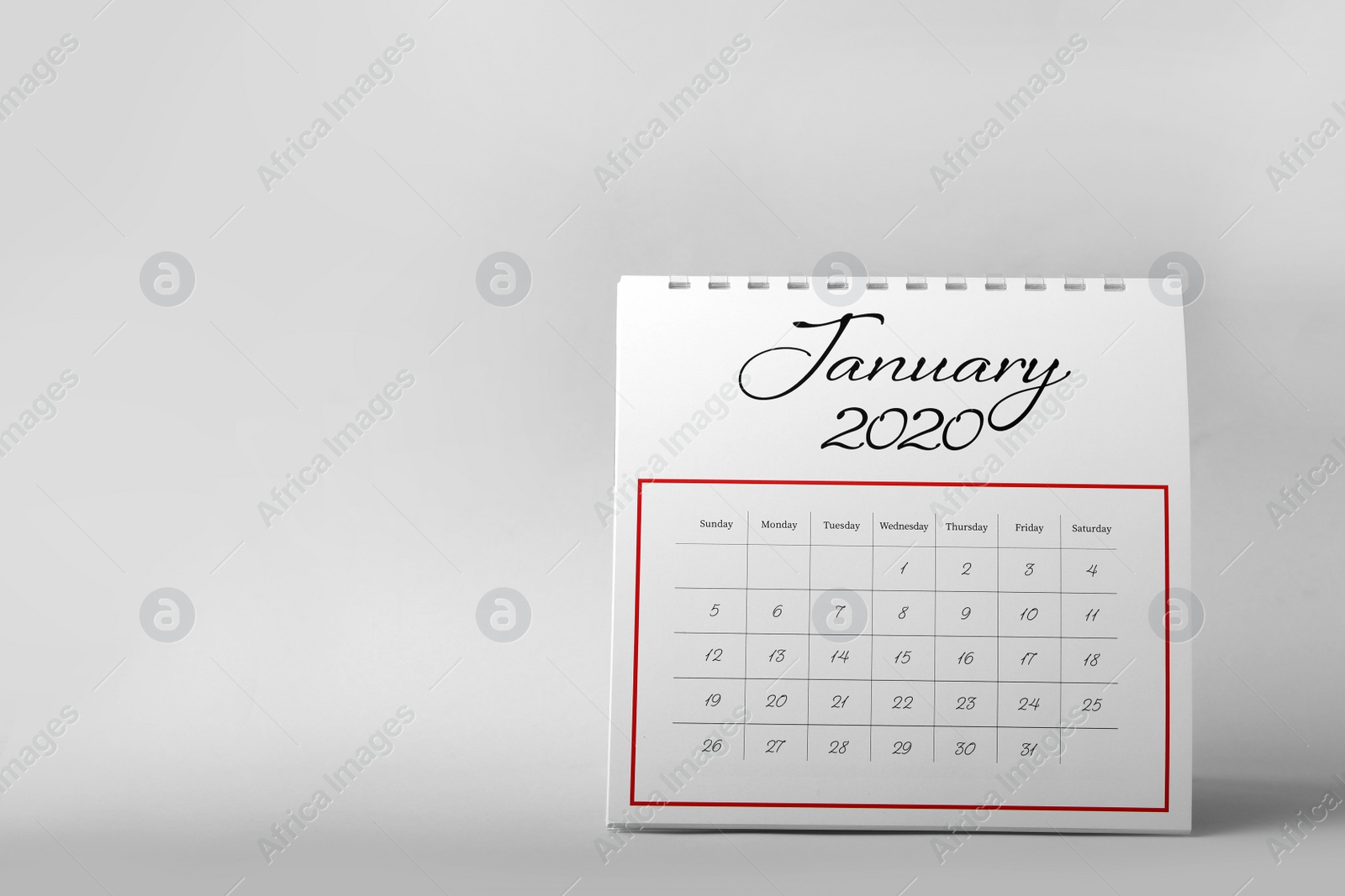 Photo of Paper calendar on grey background, space for text. Planning concept