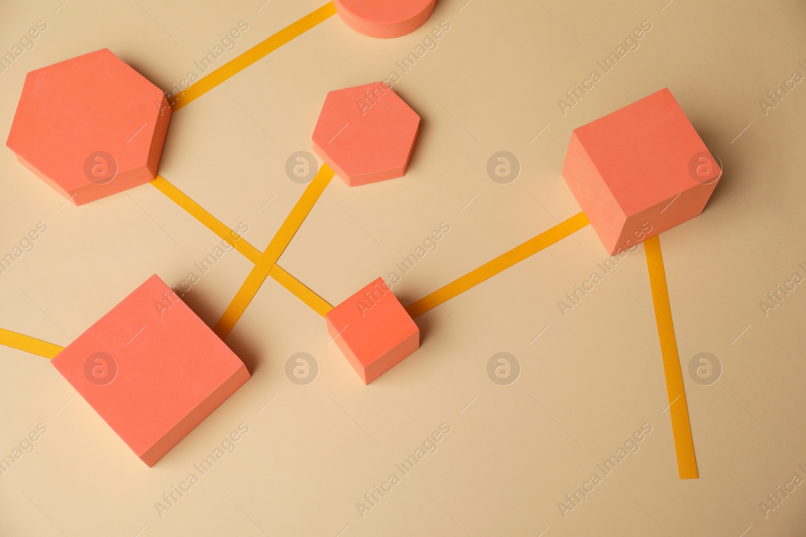 Photo of Business process organization and optimization. Scheme with geometric figures on beige background
