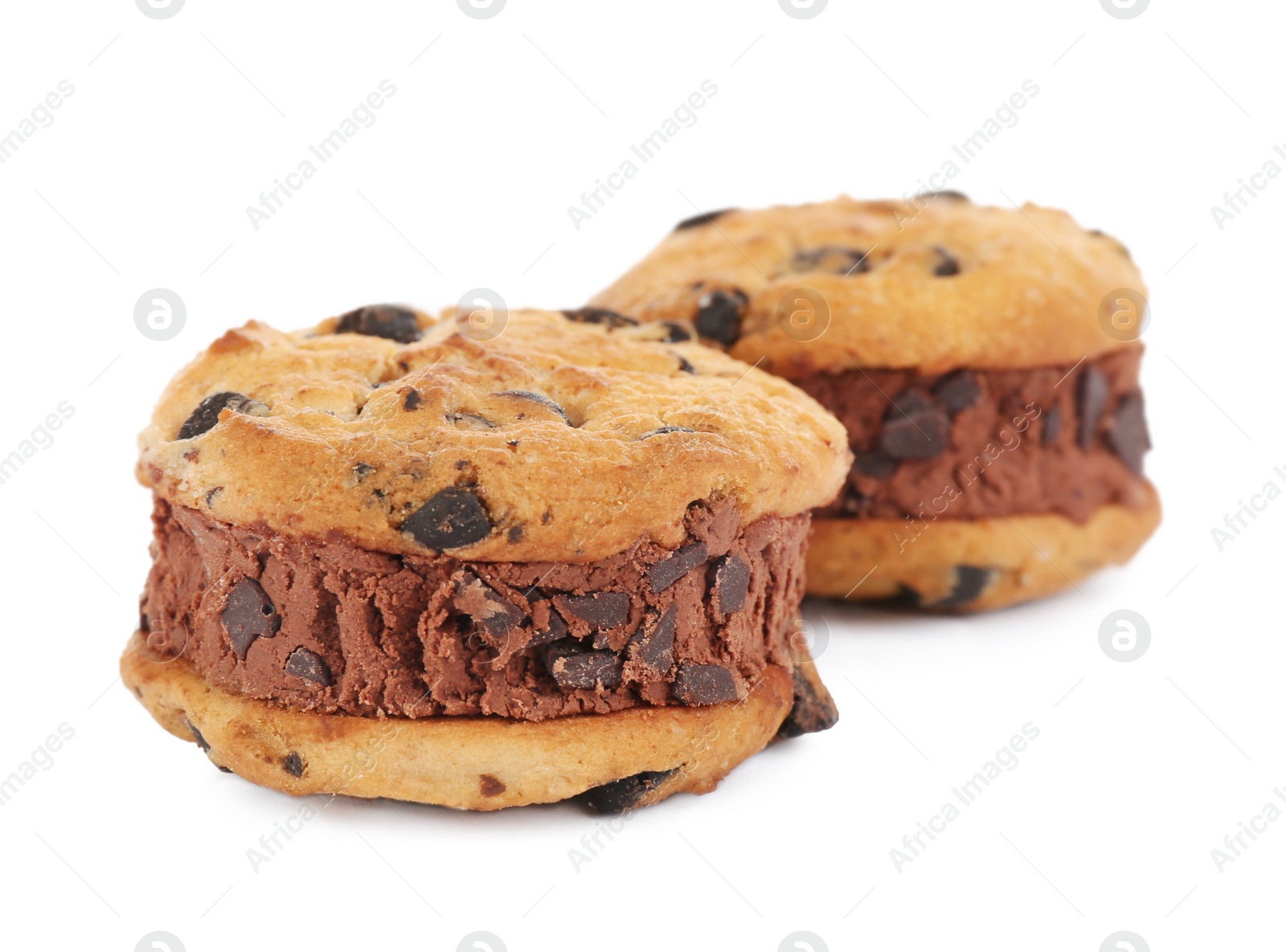 Photo of Sweet delicious ice cream cookie sandwiches isolated on white