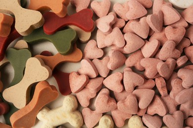 Photo of Many different vitamins for pets as background, top view