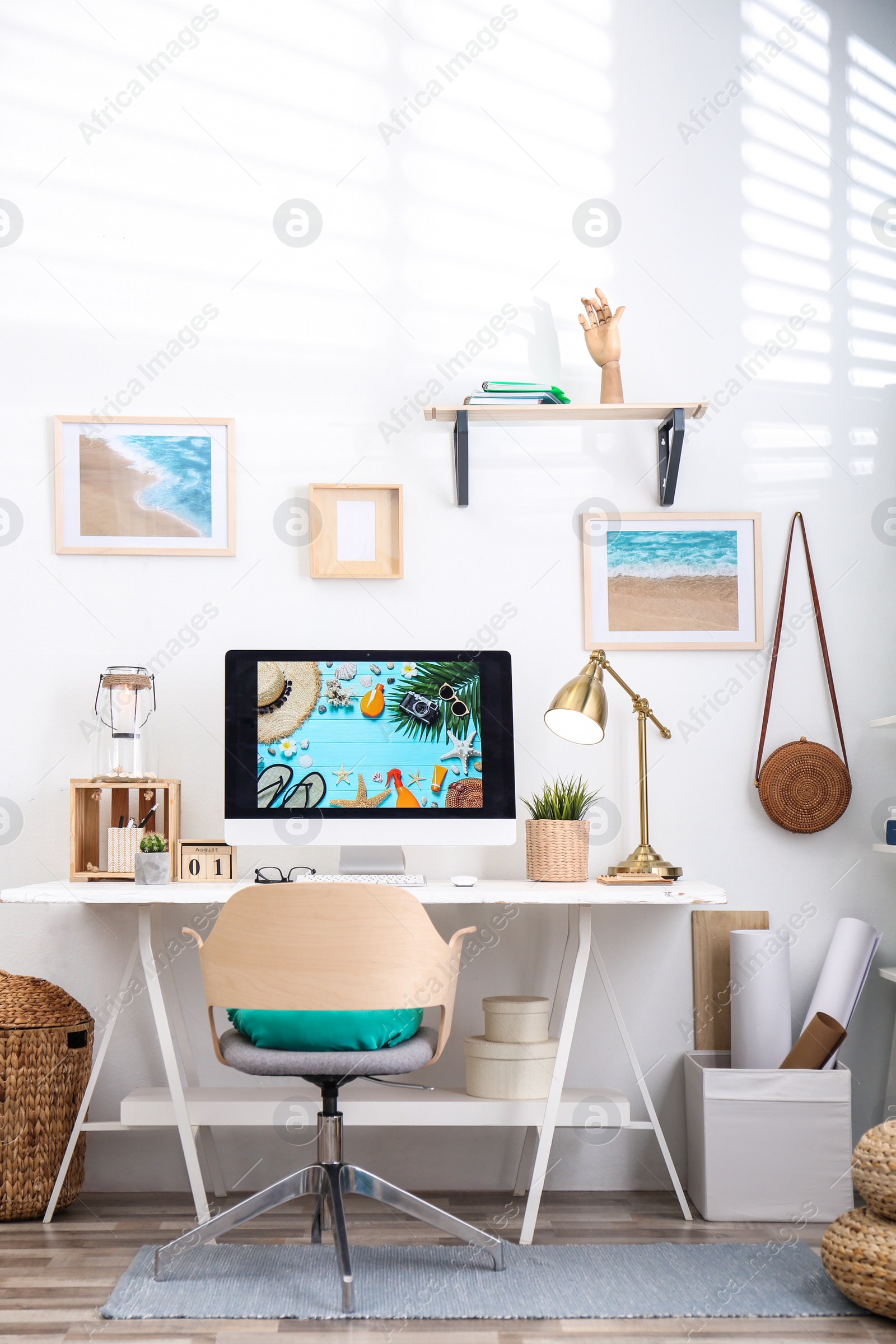 Photo of Home workplace with modern computer and desk in room