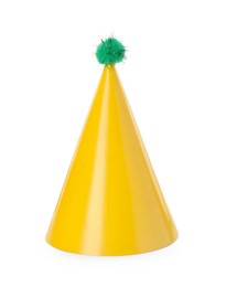 One yellow party hat with pompom isolated on white