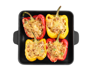 Photo of Tasty stuffed bell peppers in baking pan isolated on white, top view