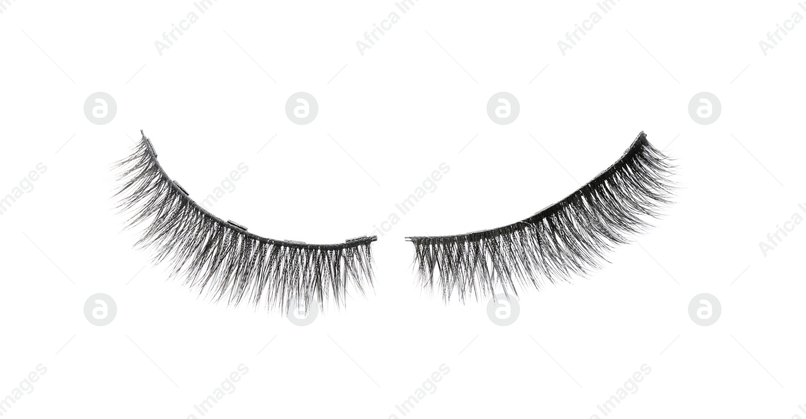 Photo of Pair of magnetic eyelashes on white background