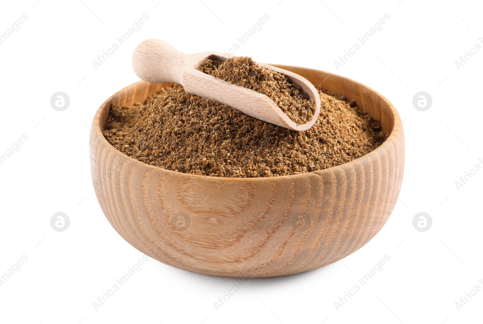 Photo of Bowl of aromatic caraway (Persian cumin) powder and scoop isolated on white