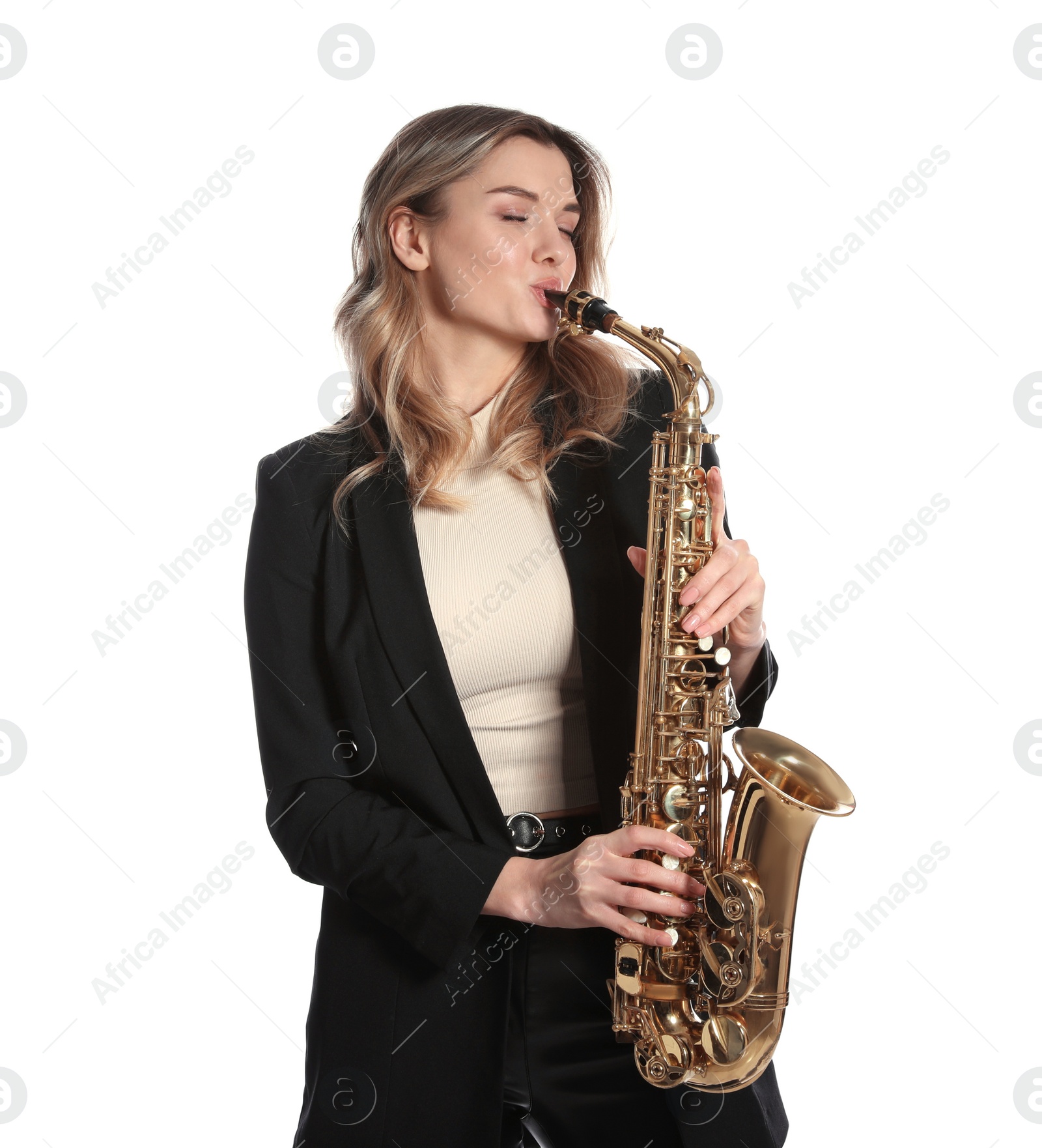 Photo of Beautiful young woman in elegant suit playing saxophone on white background