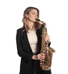 Beautiful young woman in elegant suit playing saxophone on white background