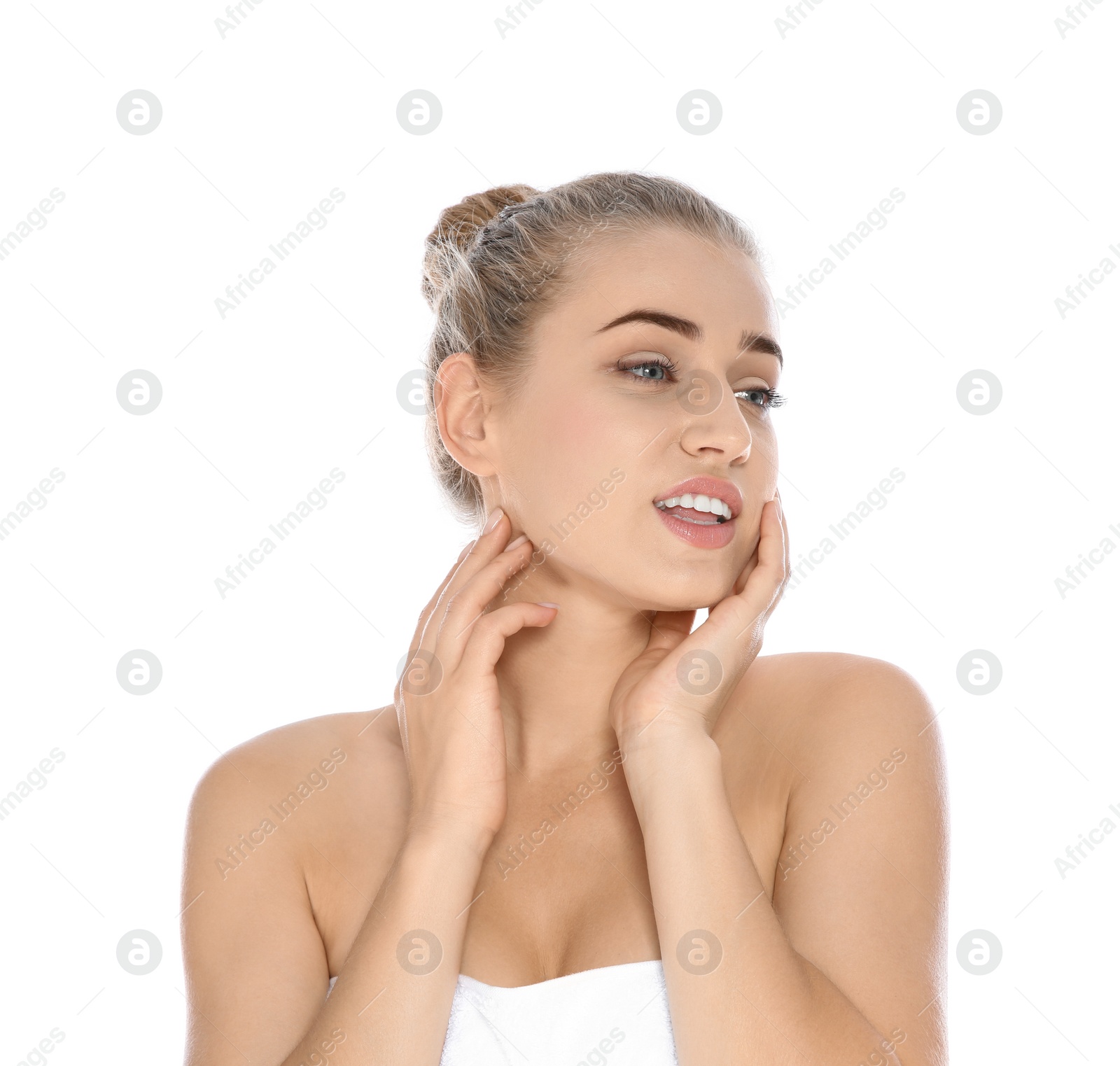 Photo of Portrait of young pretty woman with towel on white background