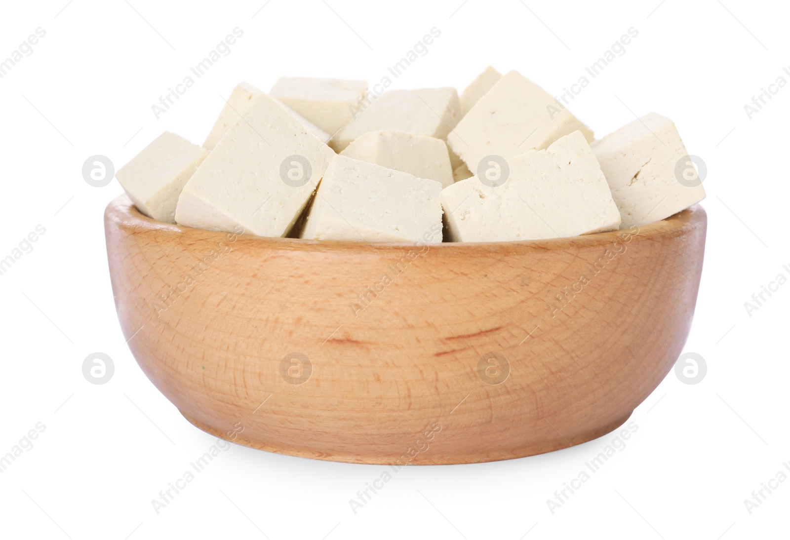 Photo of Wooden bowl with delicious tofu isolated on white