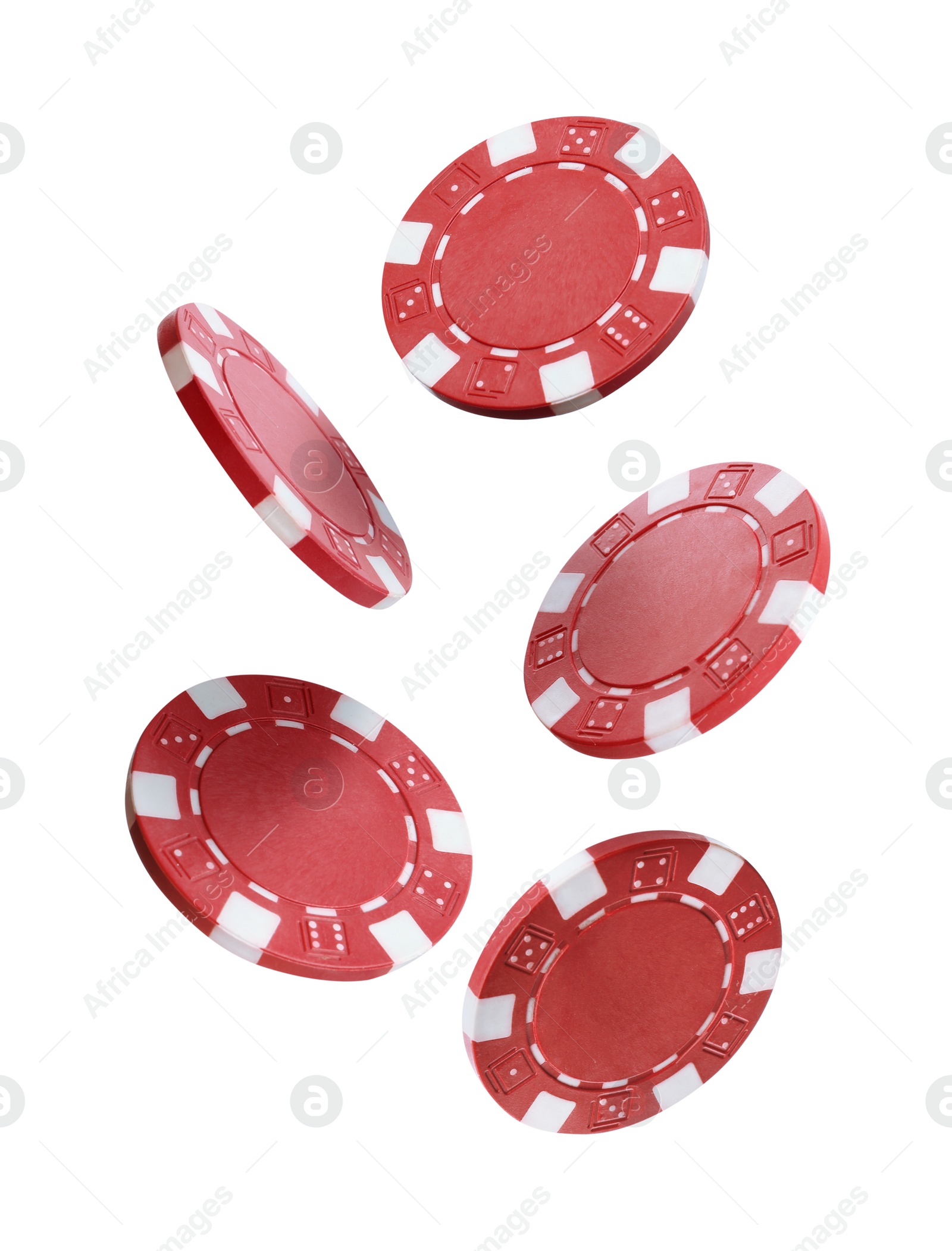 Image of Red casino chips falling on white background