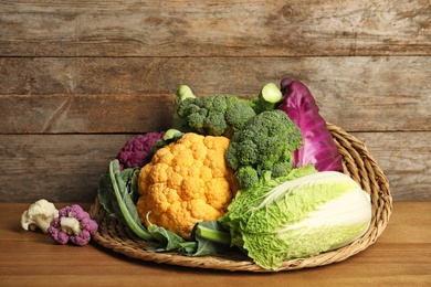 Different fresh cabbages on table. Healthy food