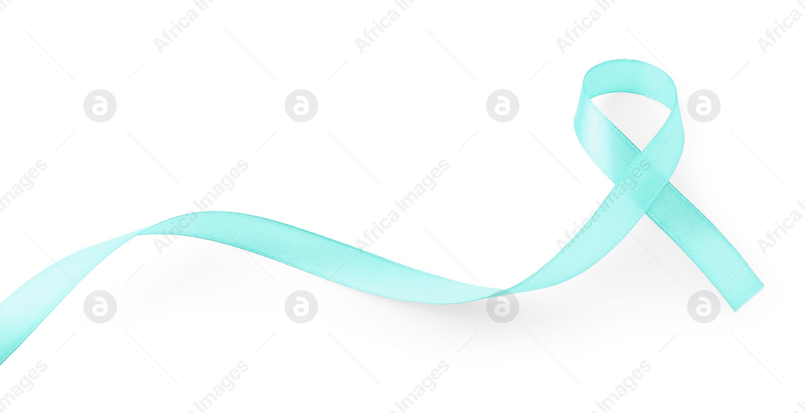 Photo of Turquoise awareness ribbon isolated on white, top view