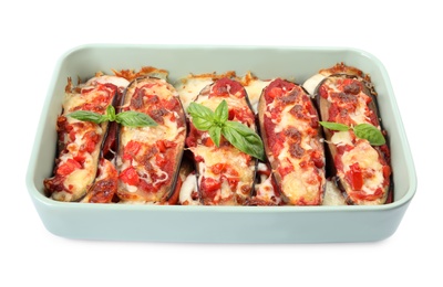 Baked eggplant with tomatoes, cheese and basil in dishware isolated on white