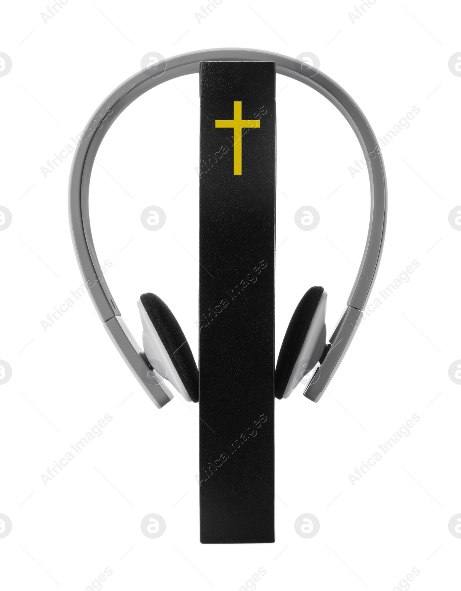 Photo of Bible and headphones on white background. Religious audiobook