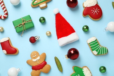 Photo of Flat lay composition with Christmas decorations on light blue background