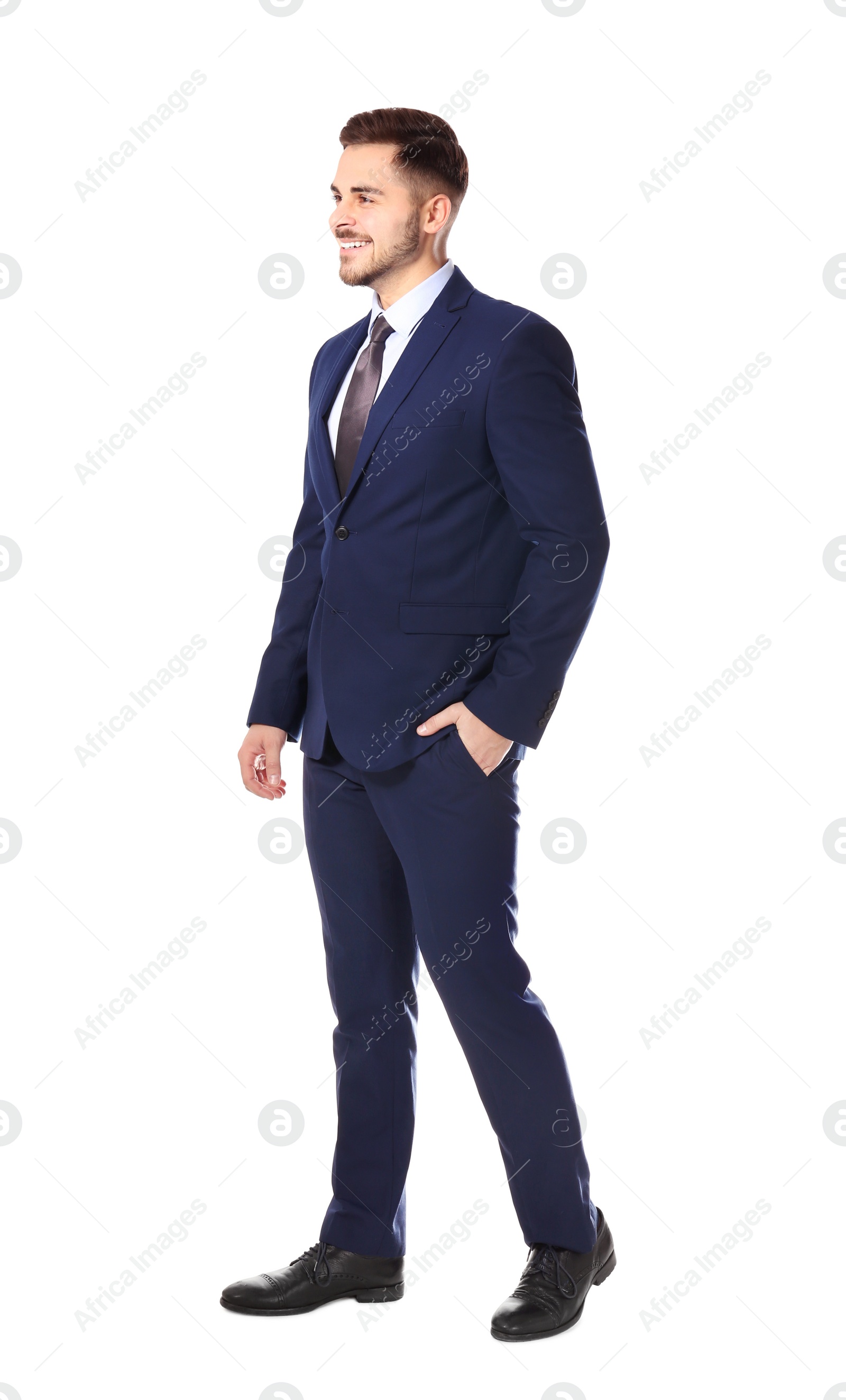 Photo of Full length portrait of businessman posing on white background