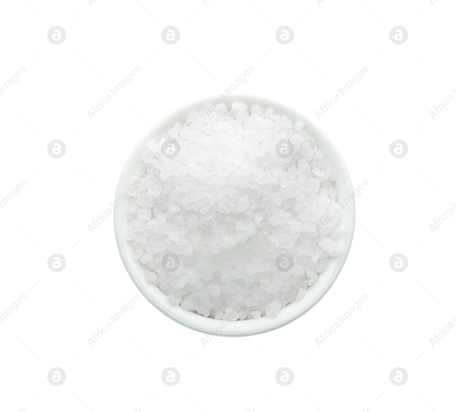 Photo of Natural salt in bowl on white background, top view