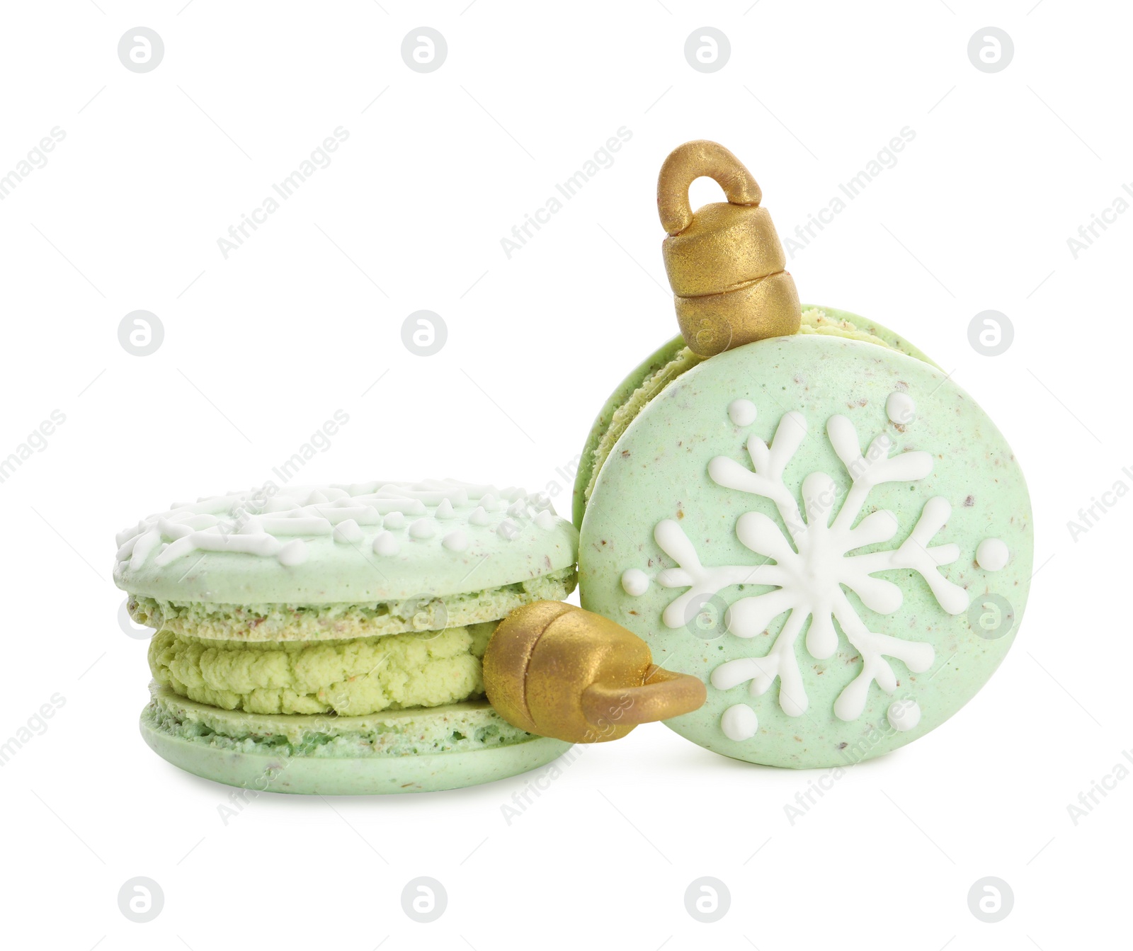 Photo of Beautifully decorated Christmas macarons on white background