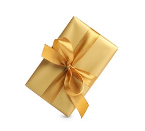 Gift box with golden ribbon and bow on white background