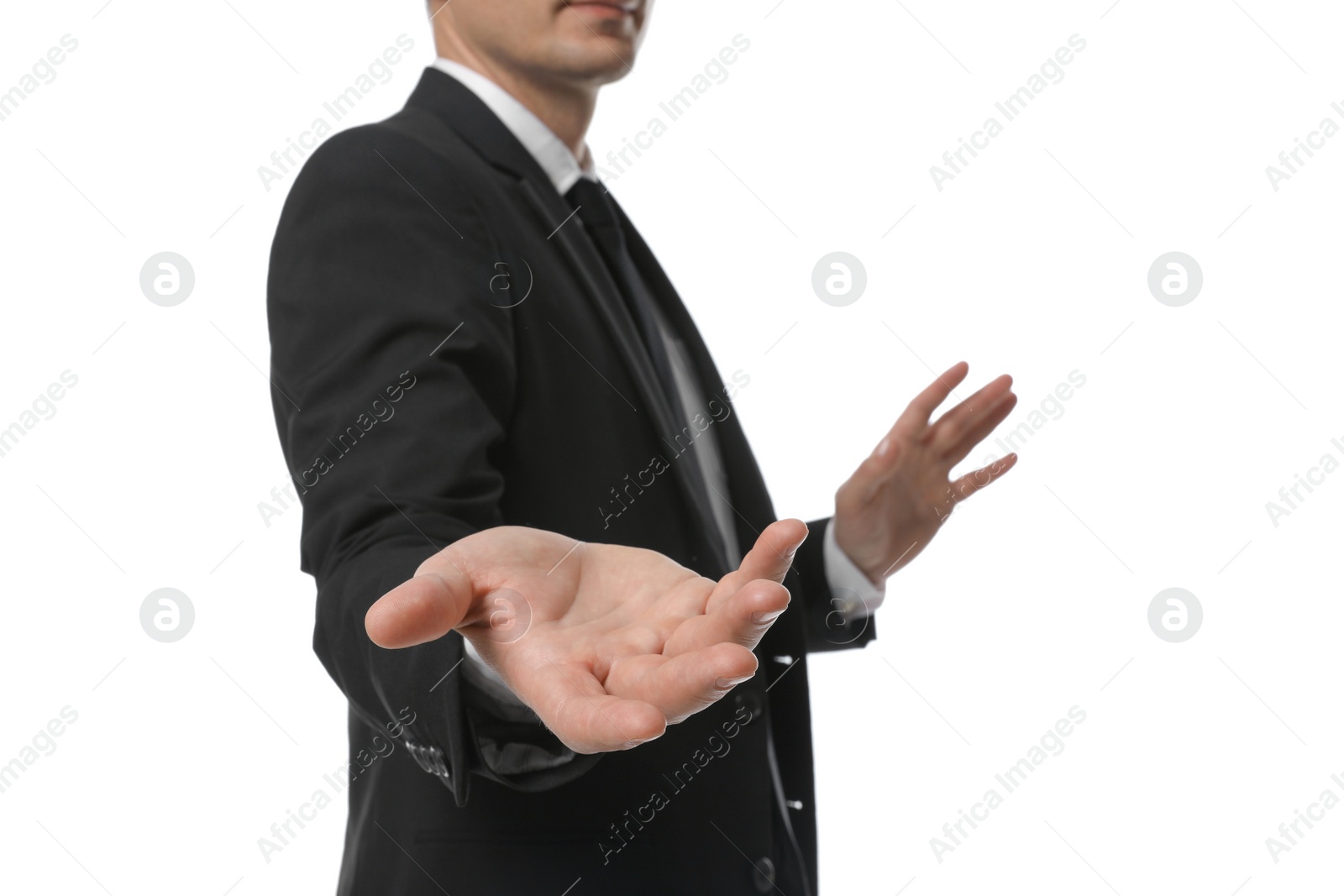 Photo of Businessman holding something on white background, closeup