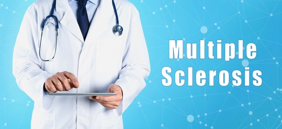 Image of Multiple Sclerosis concept. Doctor holding modern tablet on turquoise background, closeup