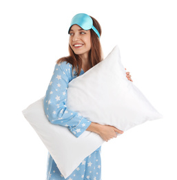 Beautiful woman with pillow and sleep mask on white background. Bedtime