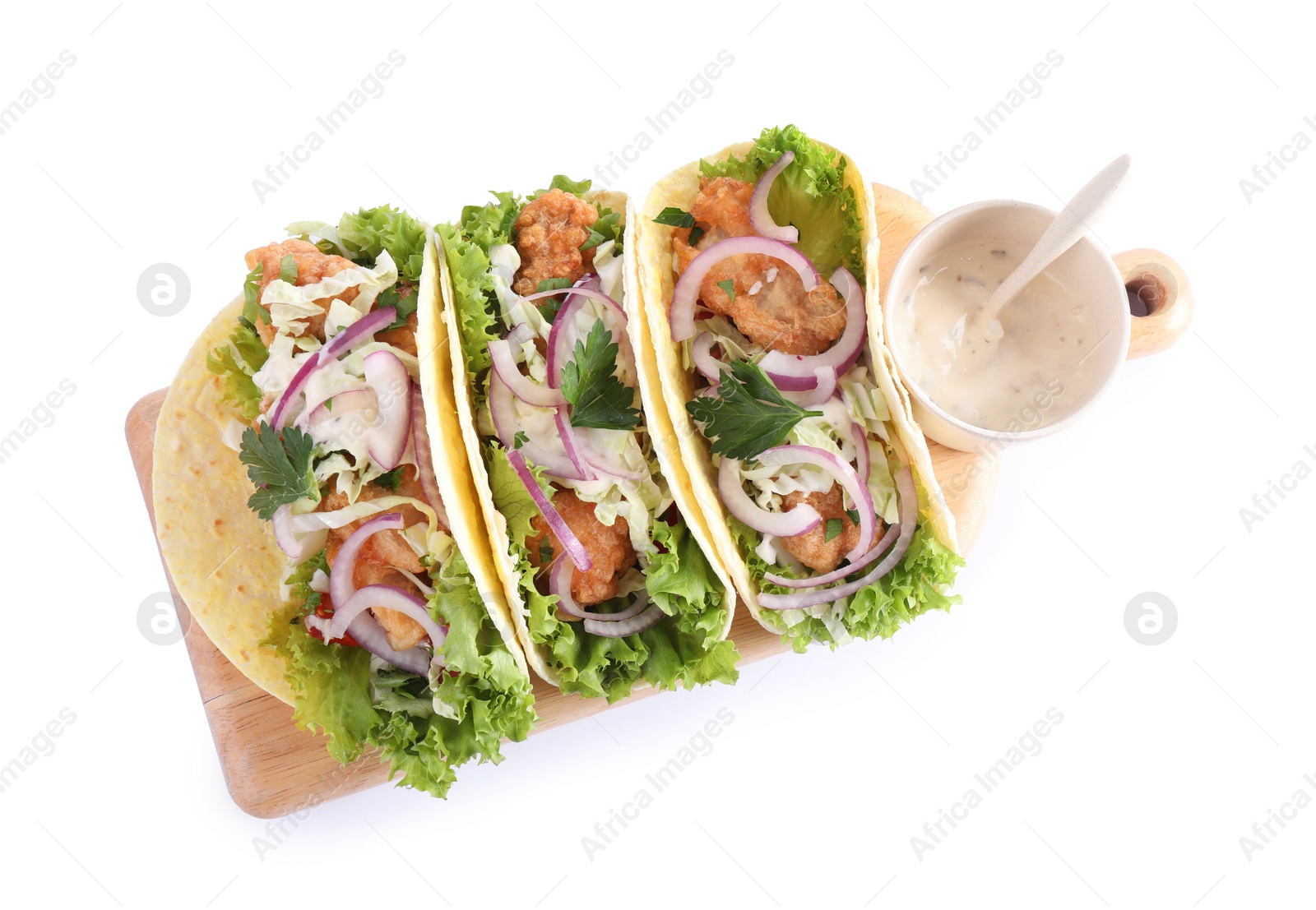 Photo of Yummy fish tacos with sauce isolated on white, top view