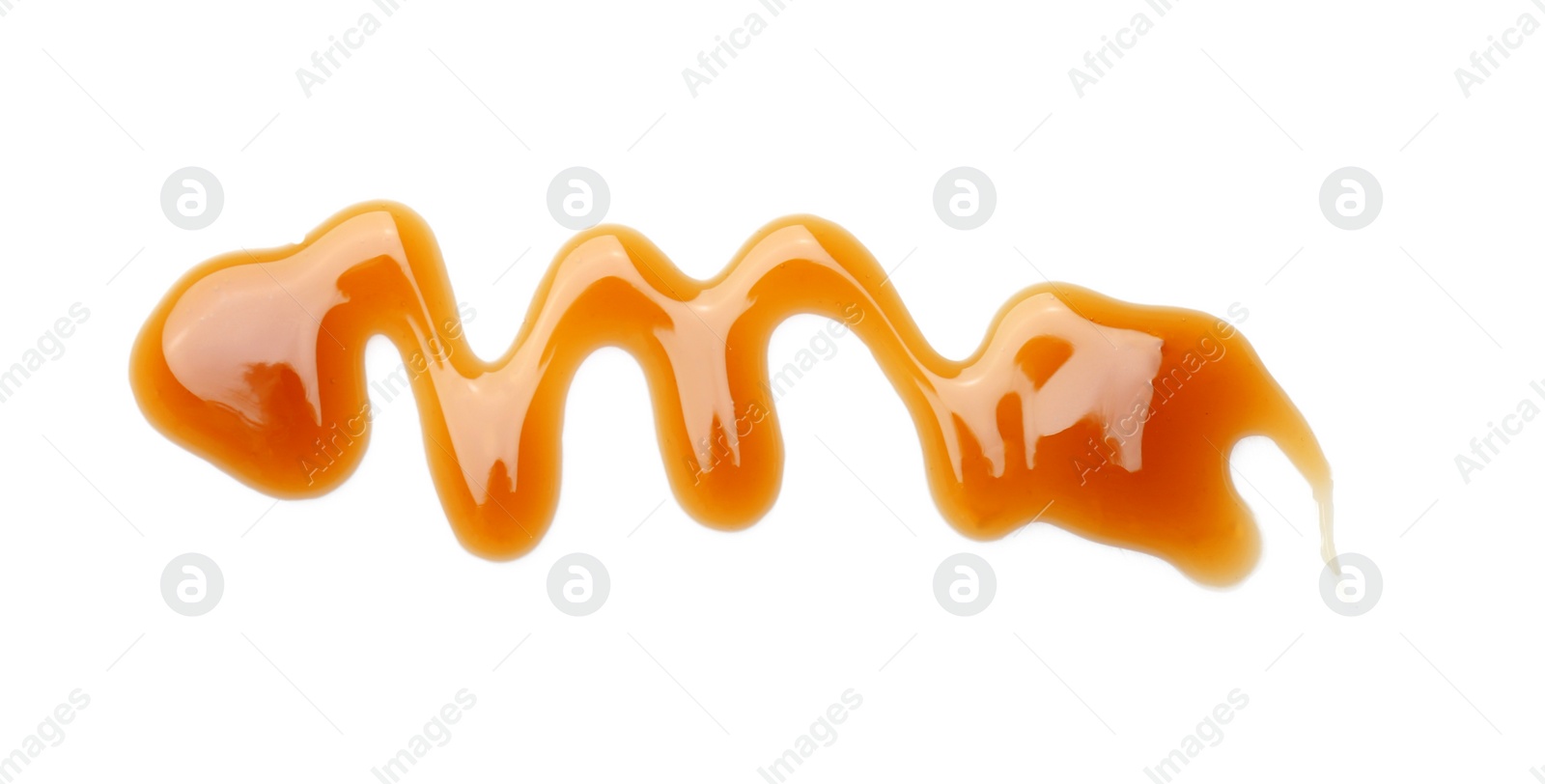 Photo of Delicious caramel sauce on white background