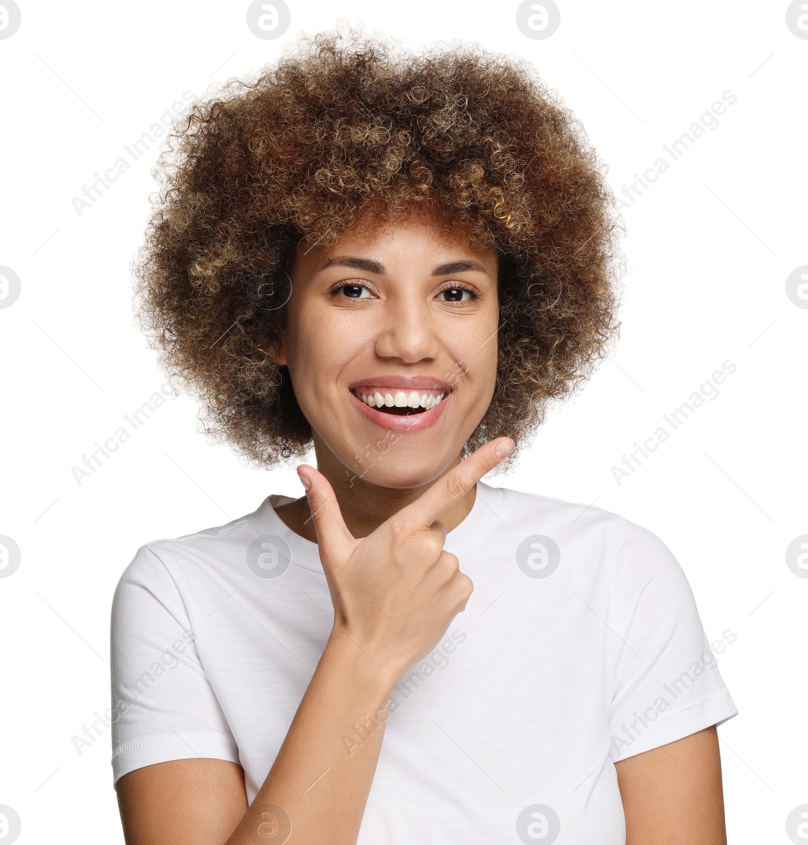 Photo of Woman showing her clean teeth and smiling on white background