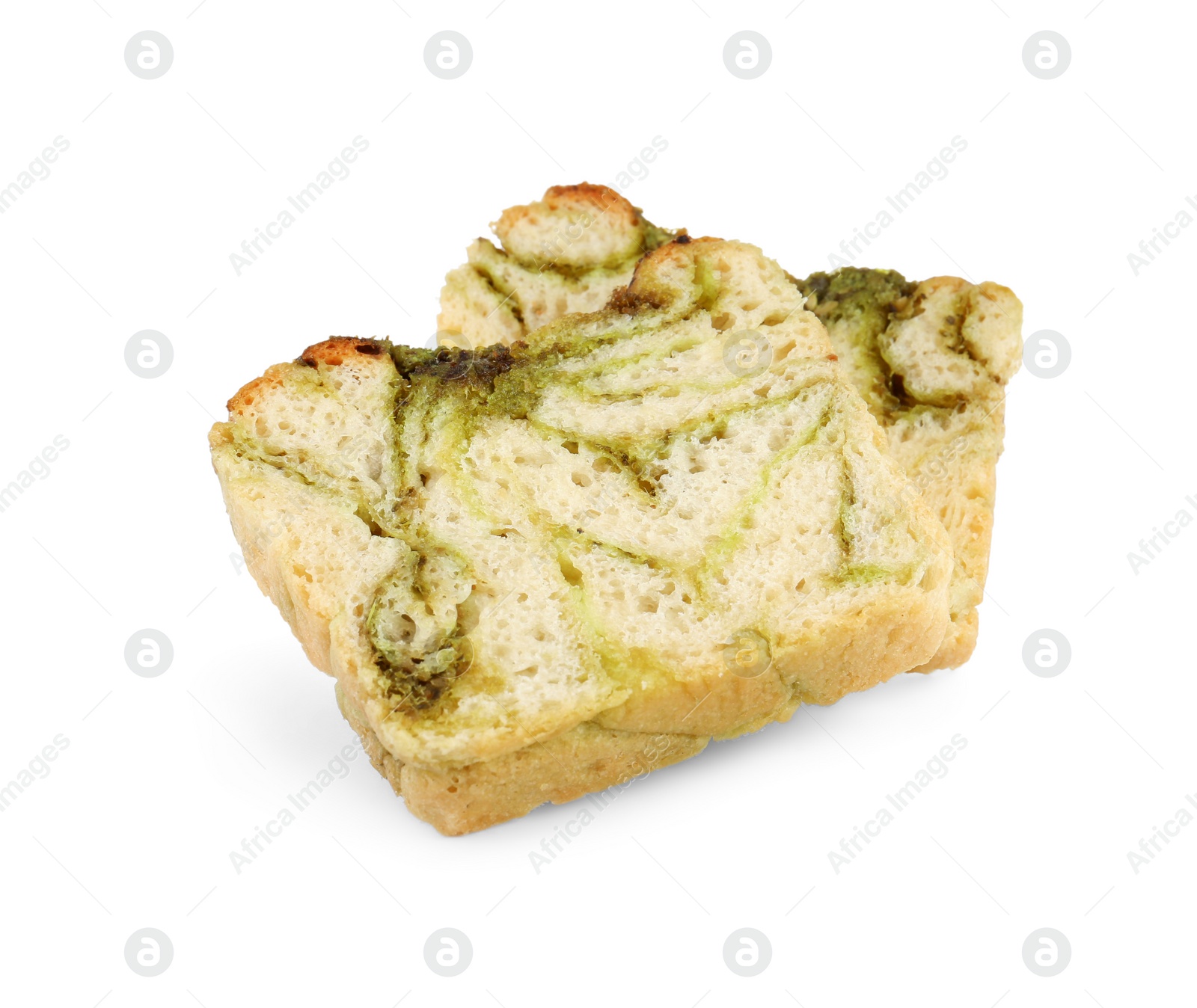 Photo of Slices of freshly baked pesto bread isolated on white