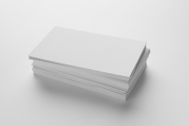 Photo of Blank business cards on white background. Mockup for design